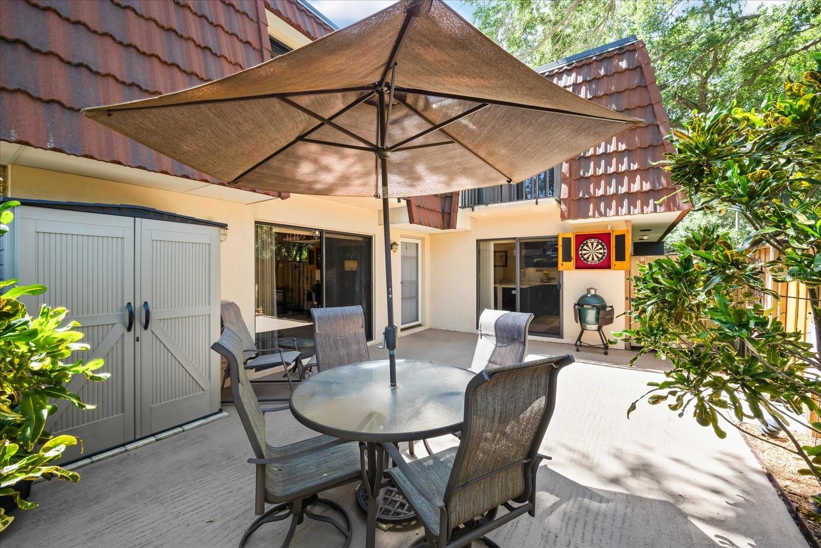 The privately fenced courtyard offers the perfect spot to dine al fresco.