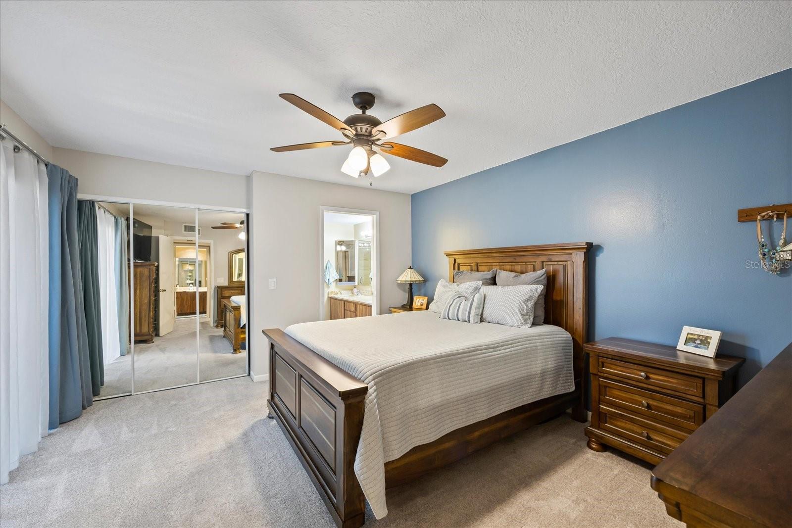 The primary suite, located on the 2nd level, is expansive and thoughtful, from the large walk-in closet with built-in organizers to the private balcony and the ensuite bathroom.