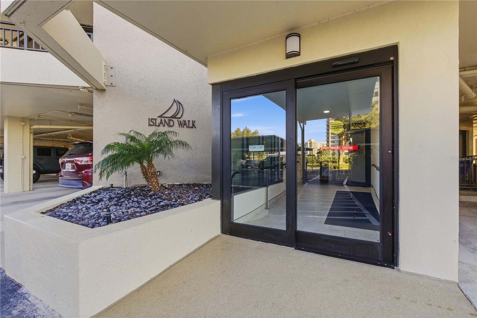 Secure automatic entry doors