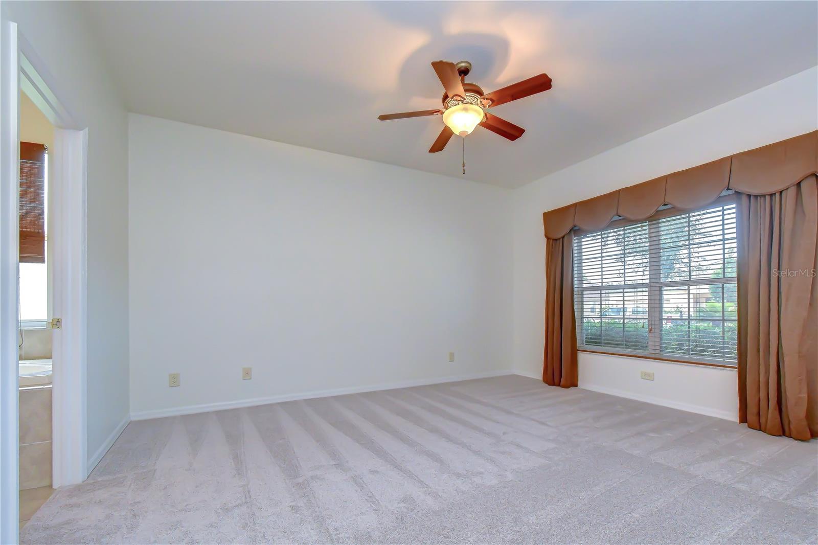 Spacious owner's retreat with room for oversized furniture.