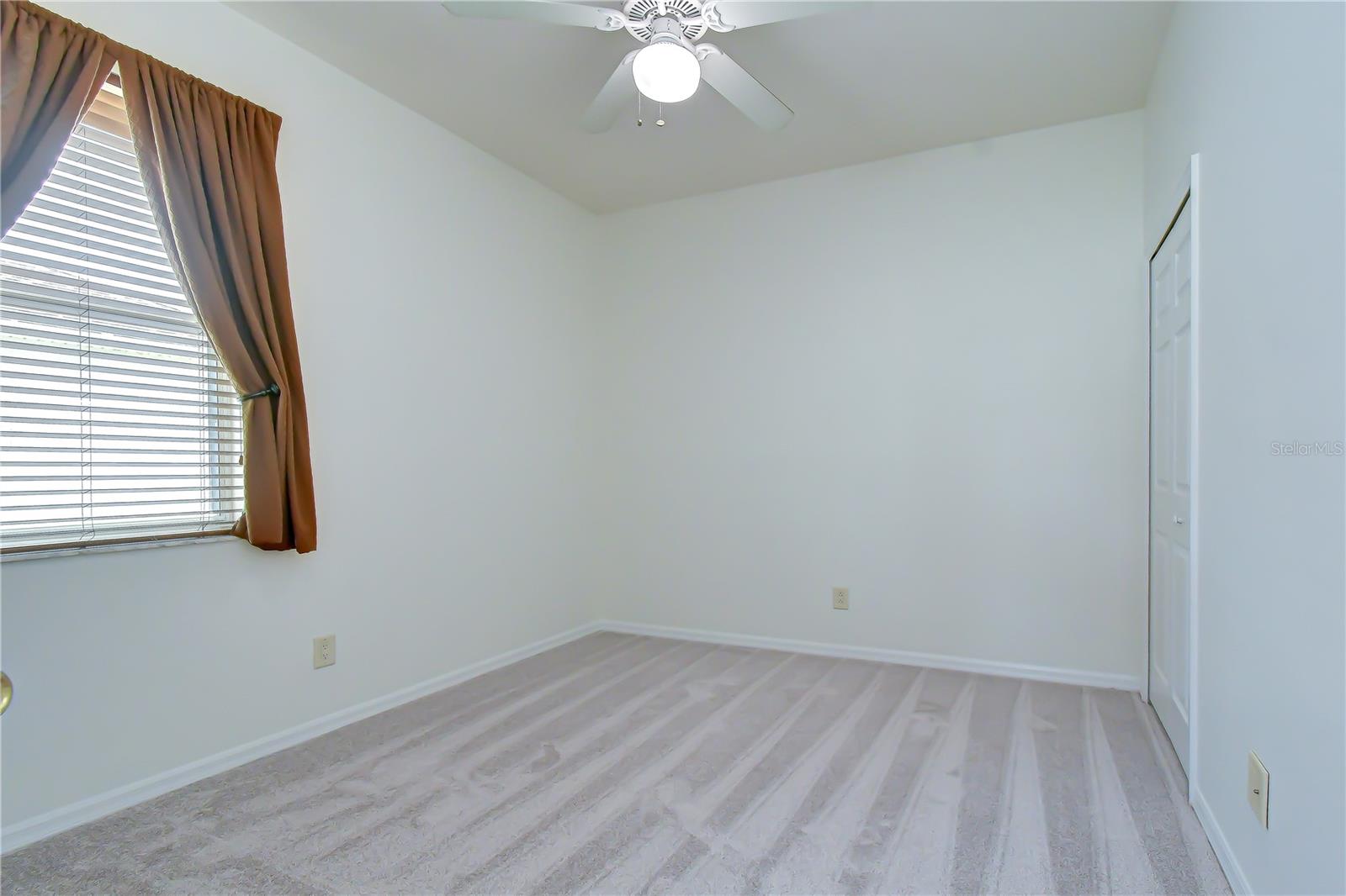 Comfortable secondary bedroom.