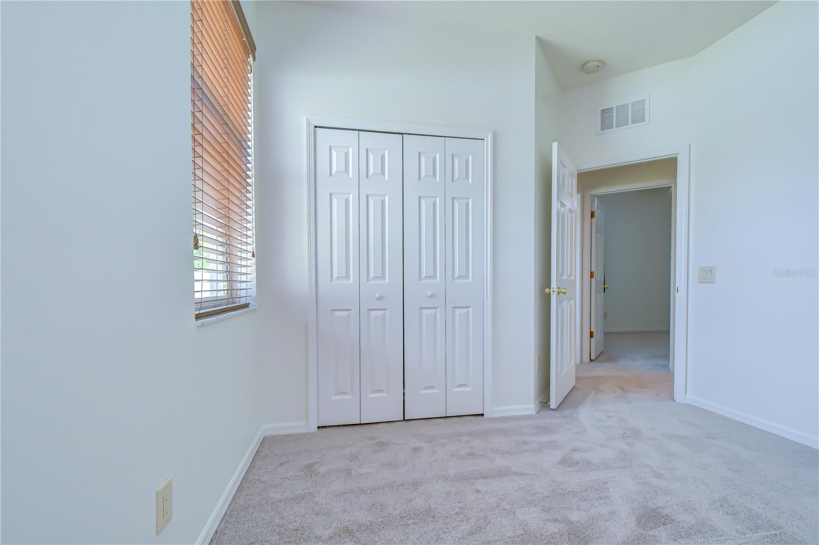 Ideal bedroom for guests, office, or hobby space.