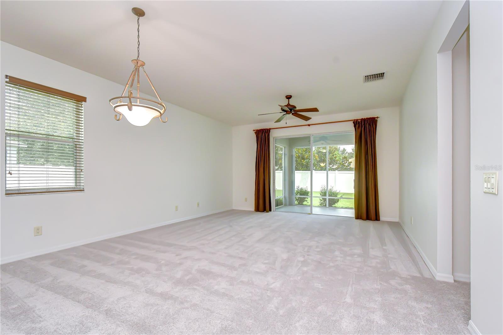 Spacious gathering area filled with natural light.