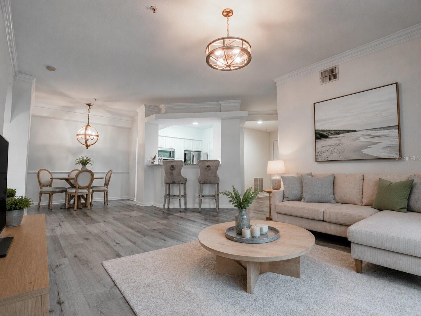 Living room facing kitchen and dining room