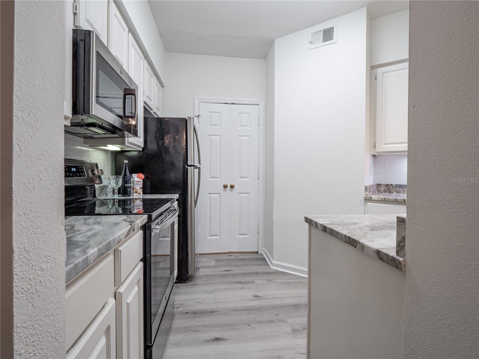 Kitchen with stone counter tops