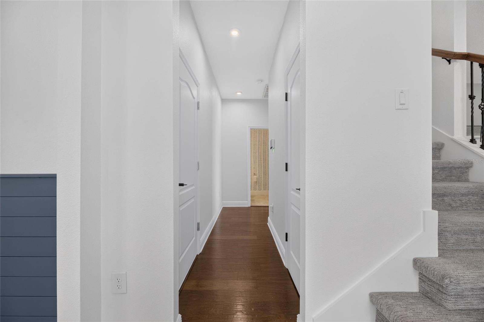 Hallway to downstairs in-law suite/bath
