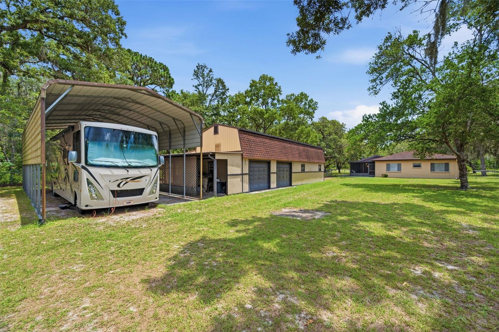RV Carport + Detached Garage/Barn
