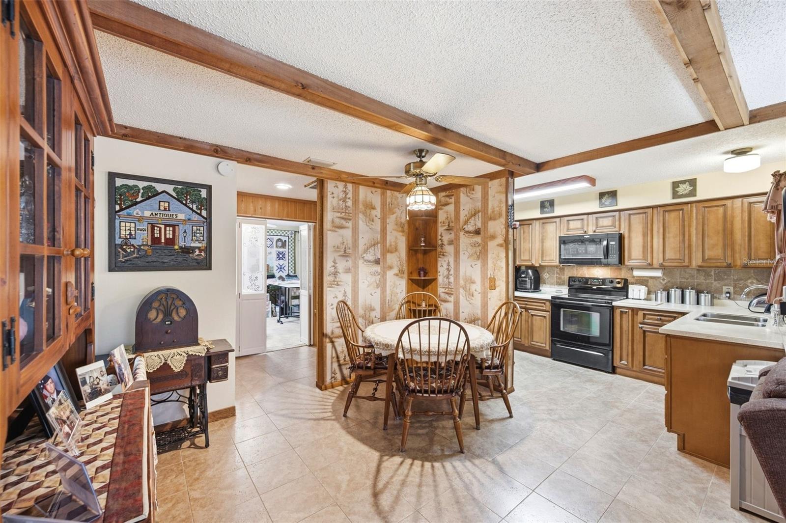 Open floor plan of the kitchen, living & dining rooms.