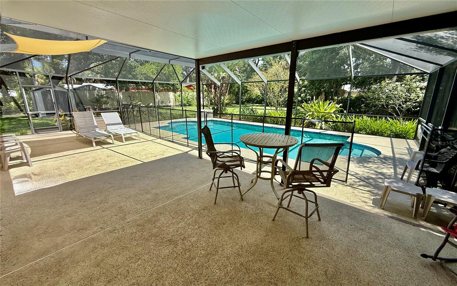 Screened and covered patio and pool
