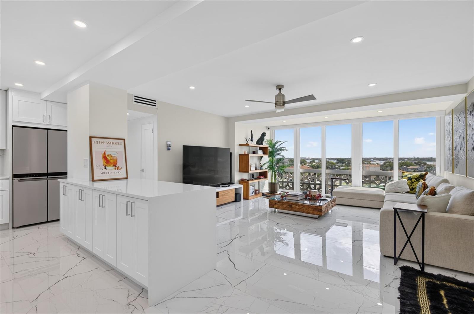 The kitchen is open to the living area with an island with seating and the view of course!