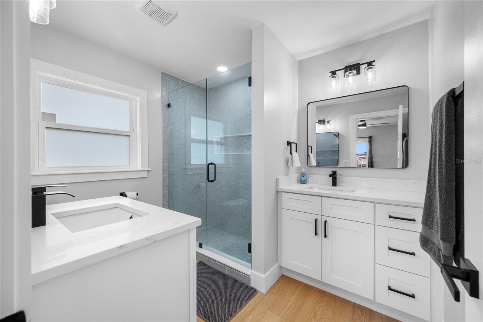Primary Full Bath next to large walk in closet