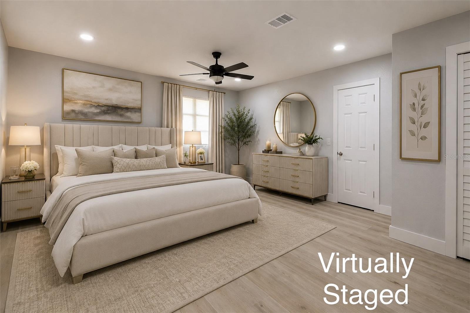 Huge master bedroom with its own private entrance door , an en-suite bathroom, large closet and a door that leads to a kitchenette