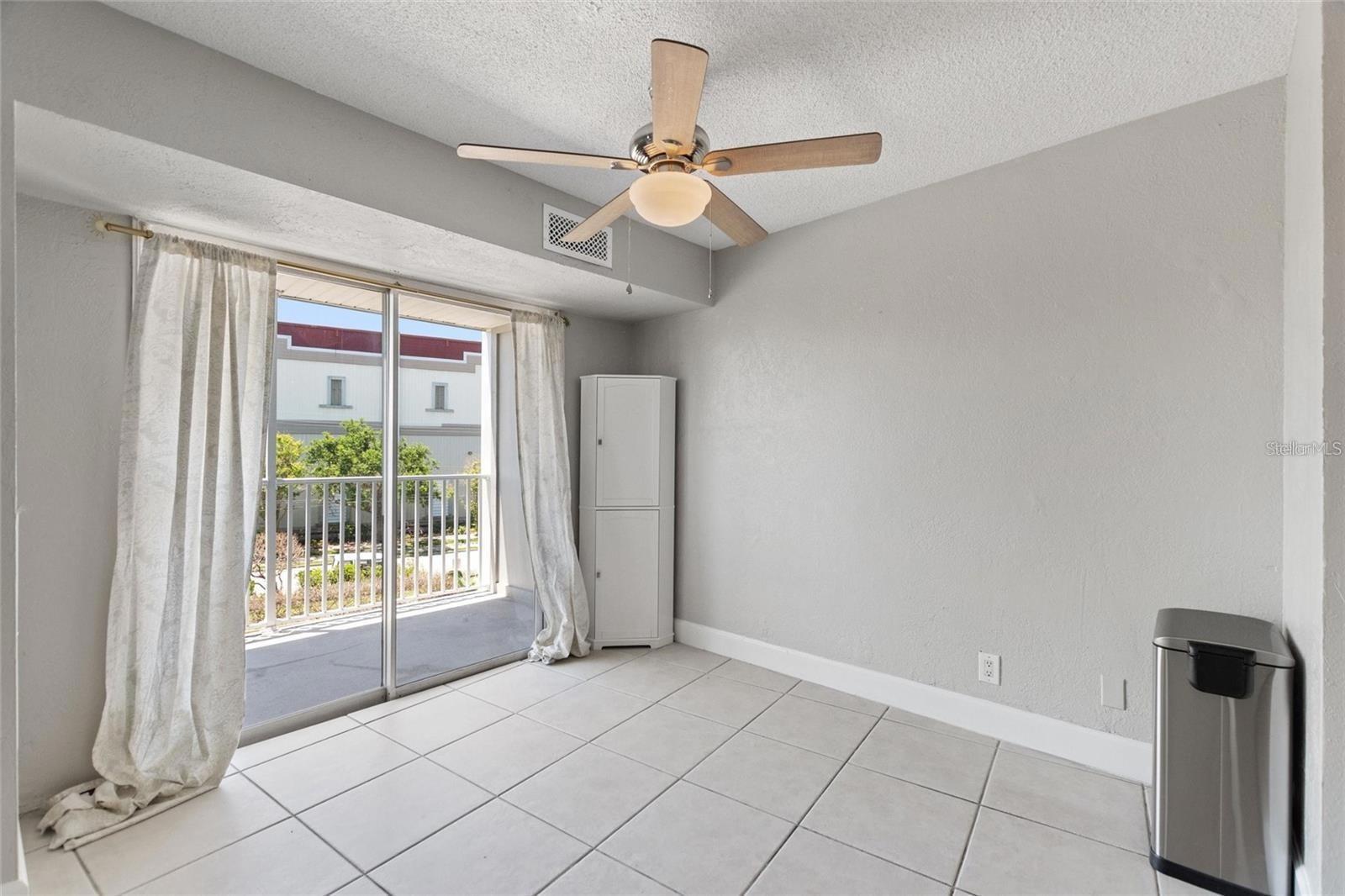 living space/ dining room toward balcony
