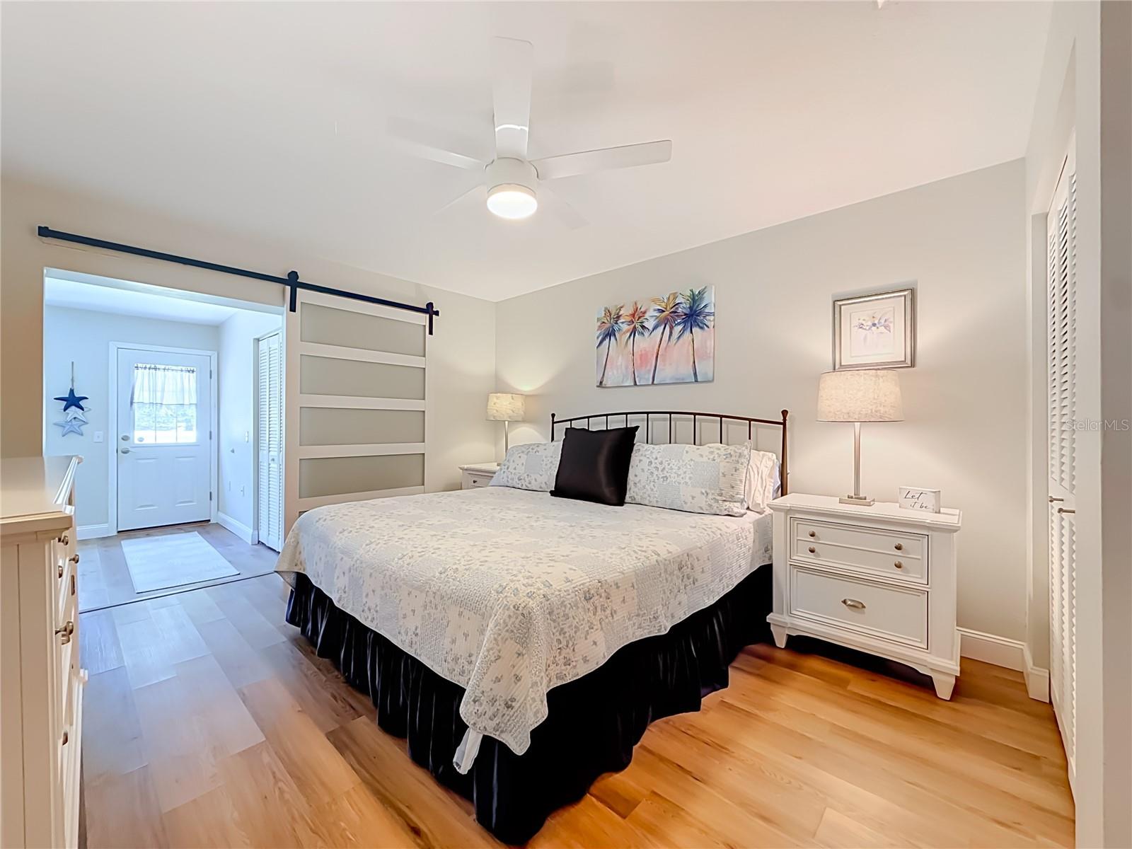 Trendy Barn Door Leads to Florida Room