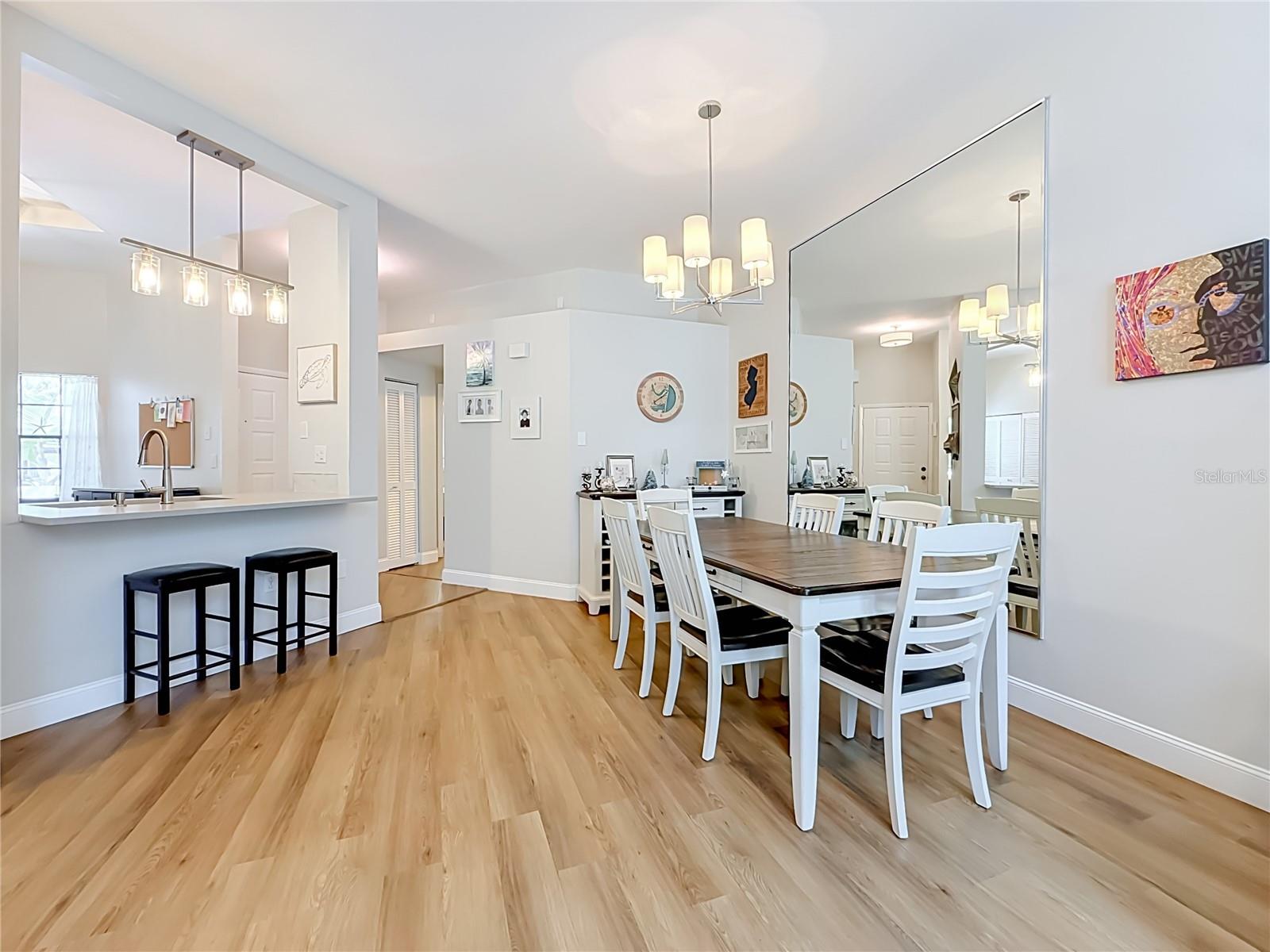 Large Dining Room and Beautiful Flooring Throughout