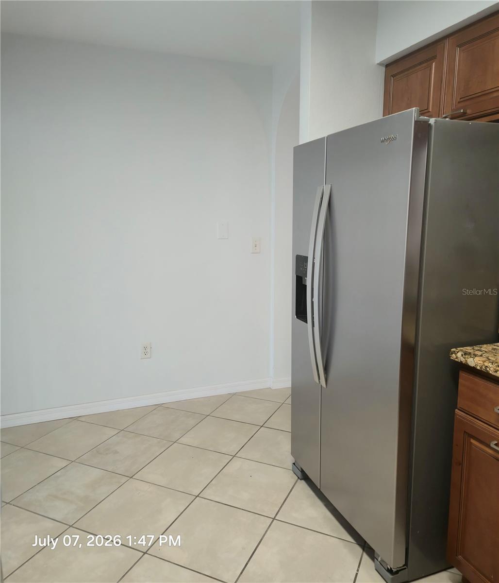 Kitchen with new refrigerator