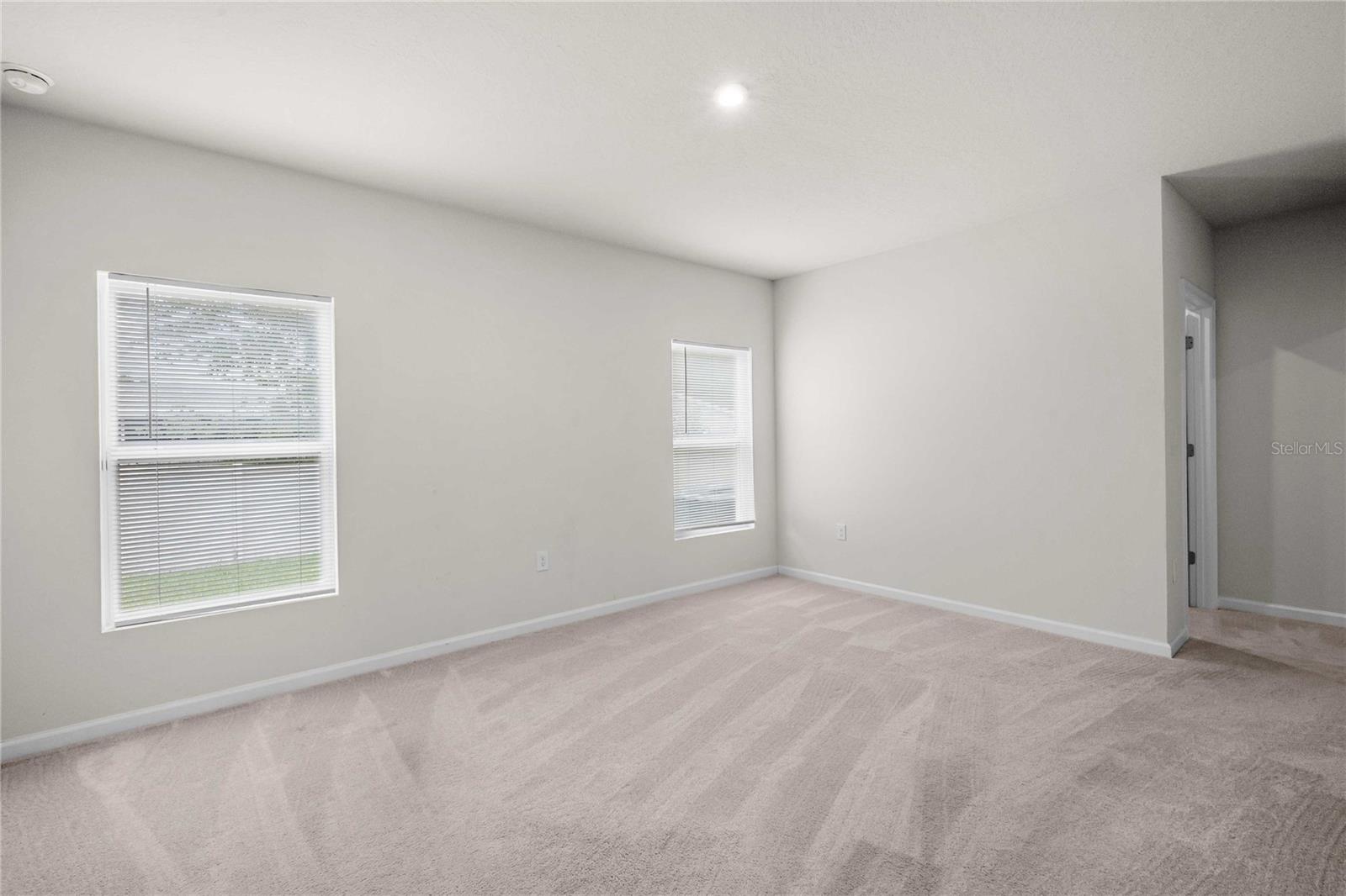 The primary has a walk in closet and ensuite bath