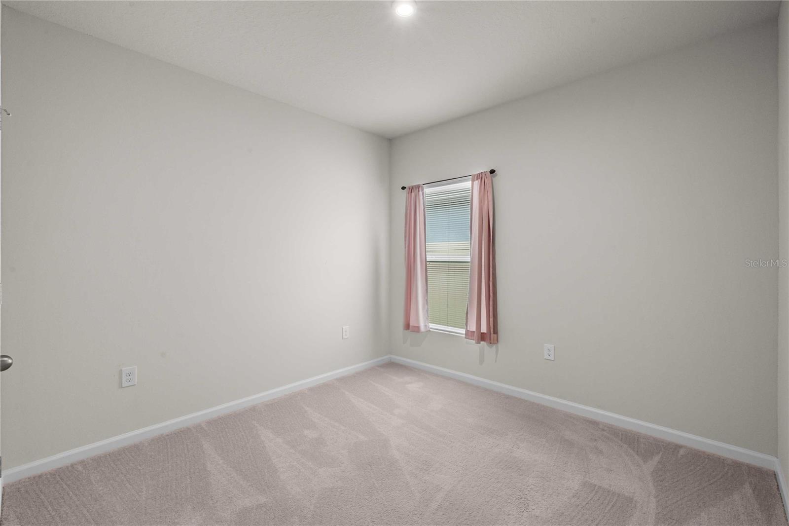 Both bedrooms are split away from the primary bedroom offering privacy