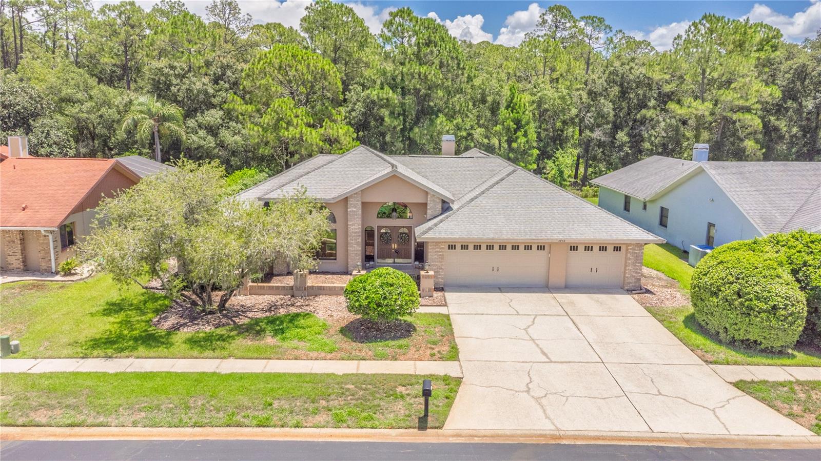 Welcome home to 3792 Windber Blvd in Palm Harbor!
