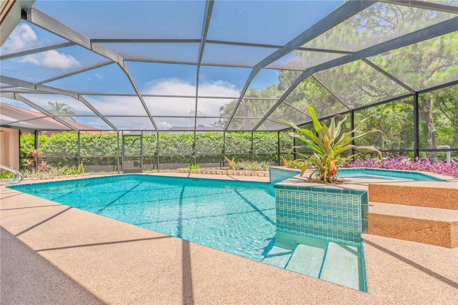 Pool with spillover spa.