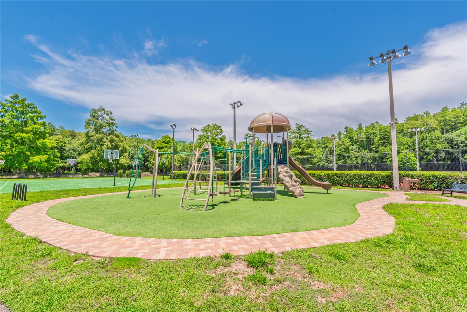 Community playground and basketball courts.