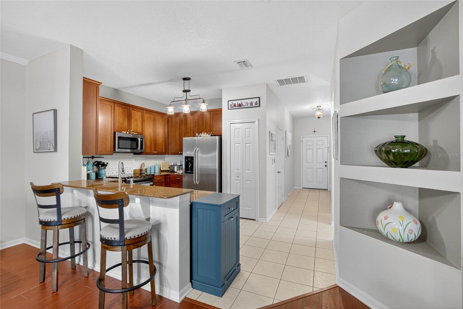 Bartop View into Kitchen and Entryway