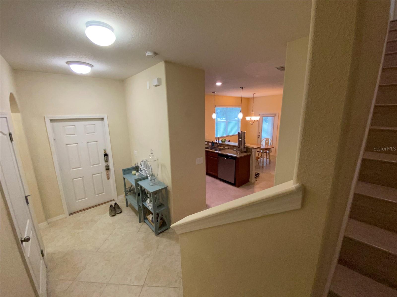 Kitchen and front door from the stair landing