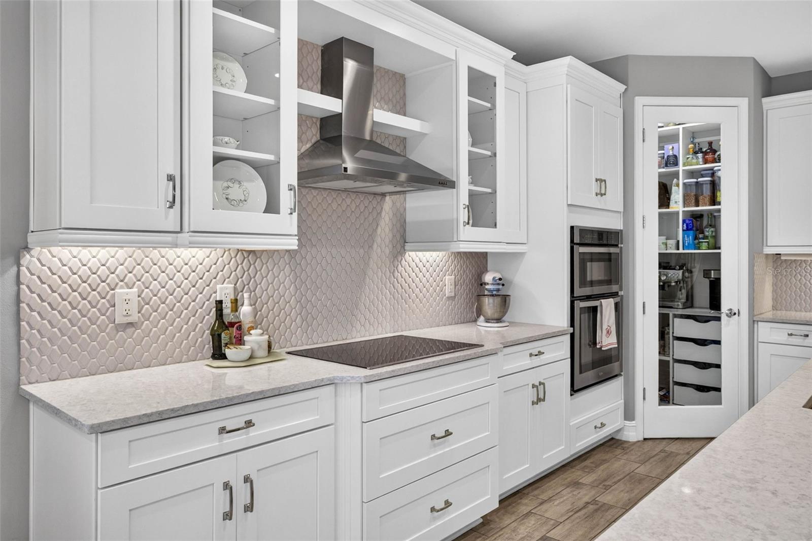Hood and cooktop + double wall oven.