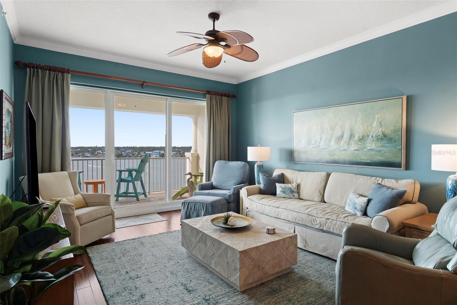 Living room with 12x8 storm hurricane grade sliders to balcony