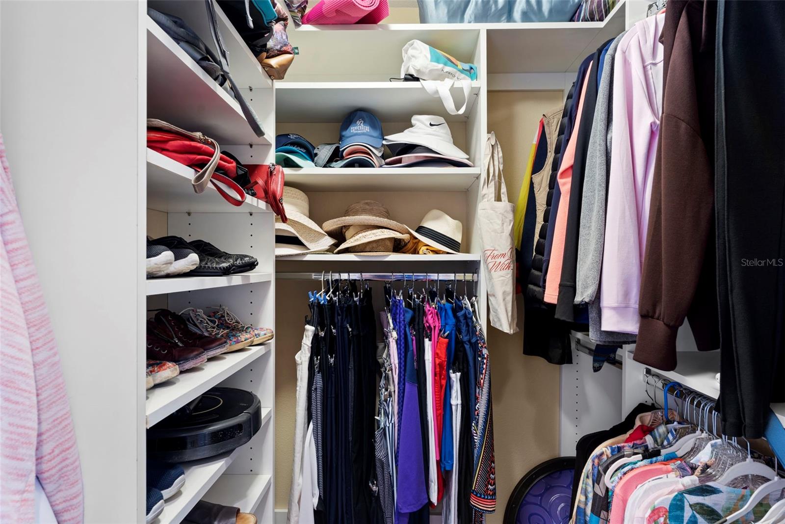 His & Her walk in customized built in closets
