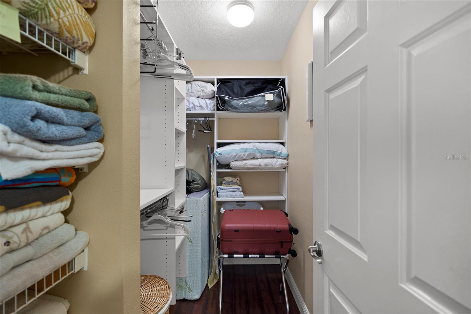 Guest Bedroom en-suite #3 walk in fully turn key stocked custom built in closet