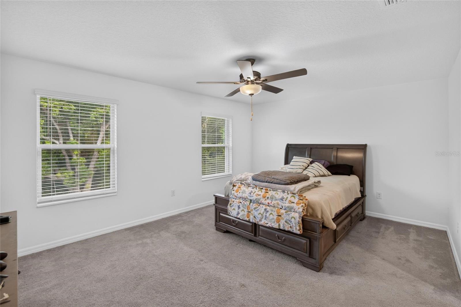 Primary Bedroom with Walk in Closet and Bathroom