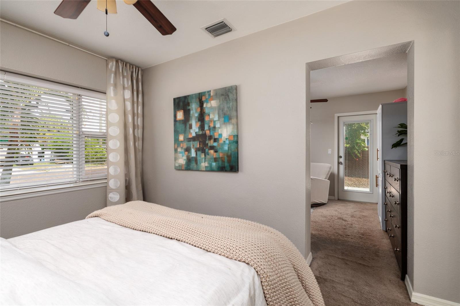Primary bedroom into bonus room.