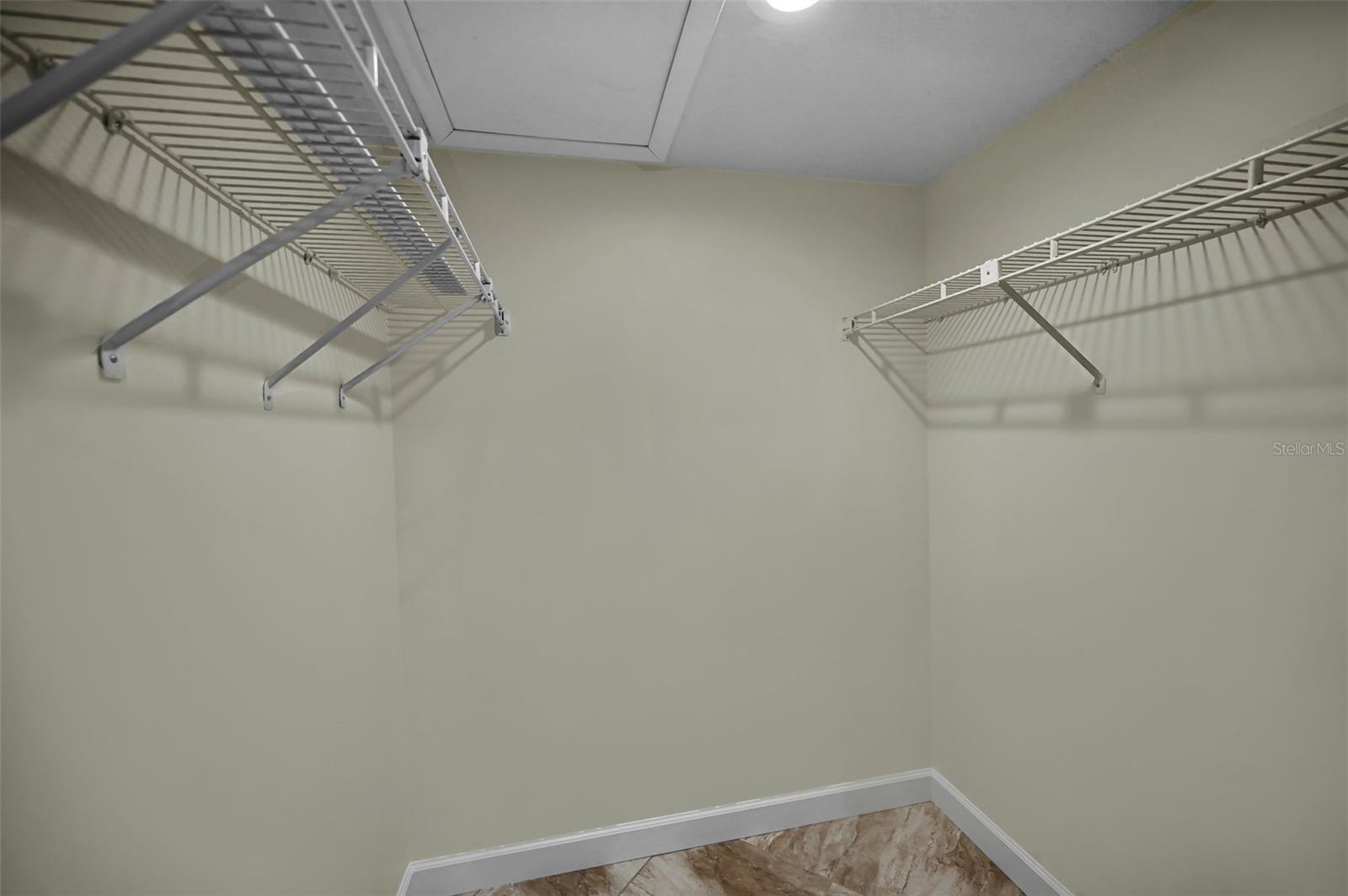 Primary bedroom large walk in closet