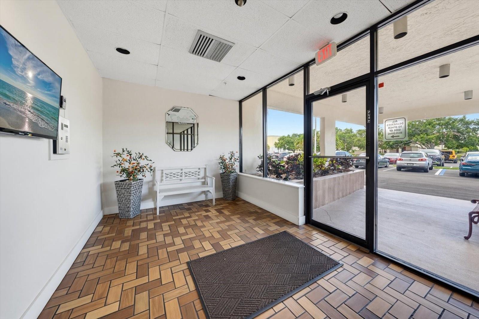 Front lobby entrance featuring secure entry