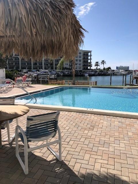 Relax under the shade a the tiki table.