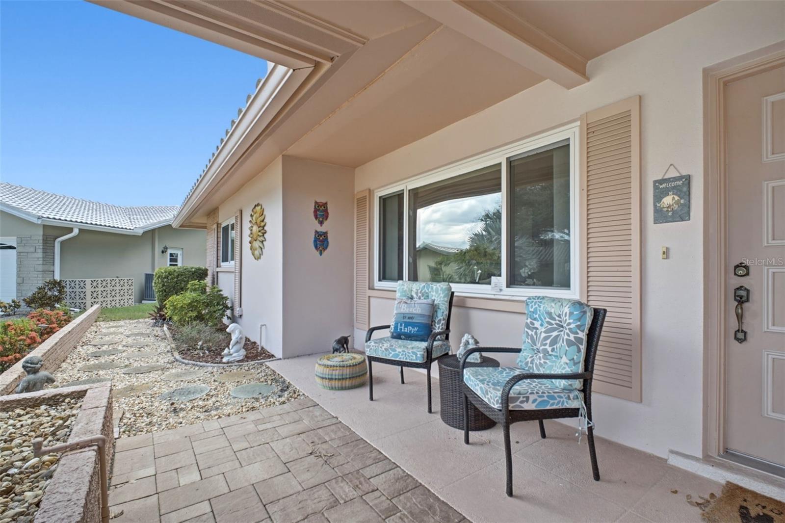 Gracious & inviting front patio~