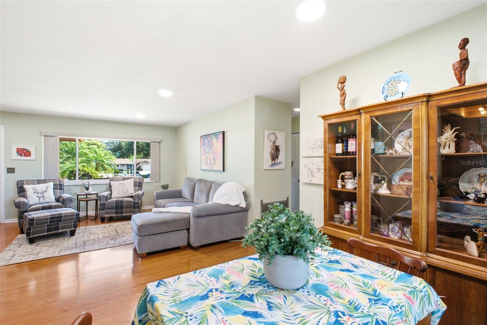 Hall leads to the primary suite & guest retreat with an updated hall bath~