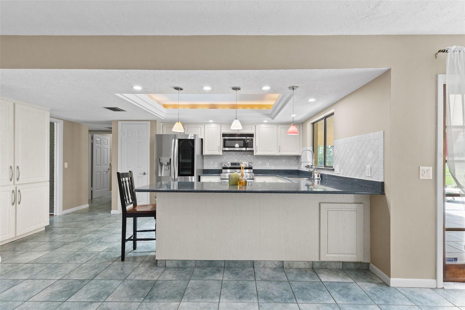 Kitchen and breakfast bar
