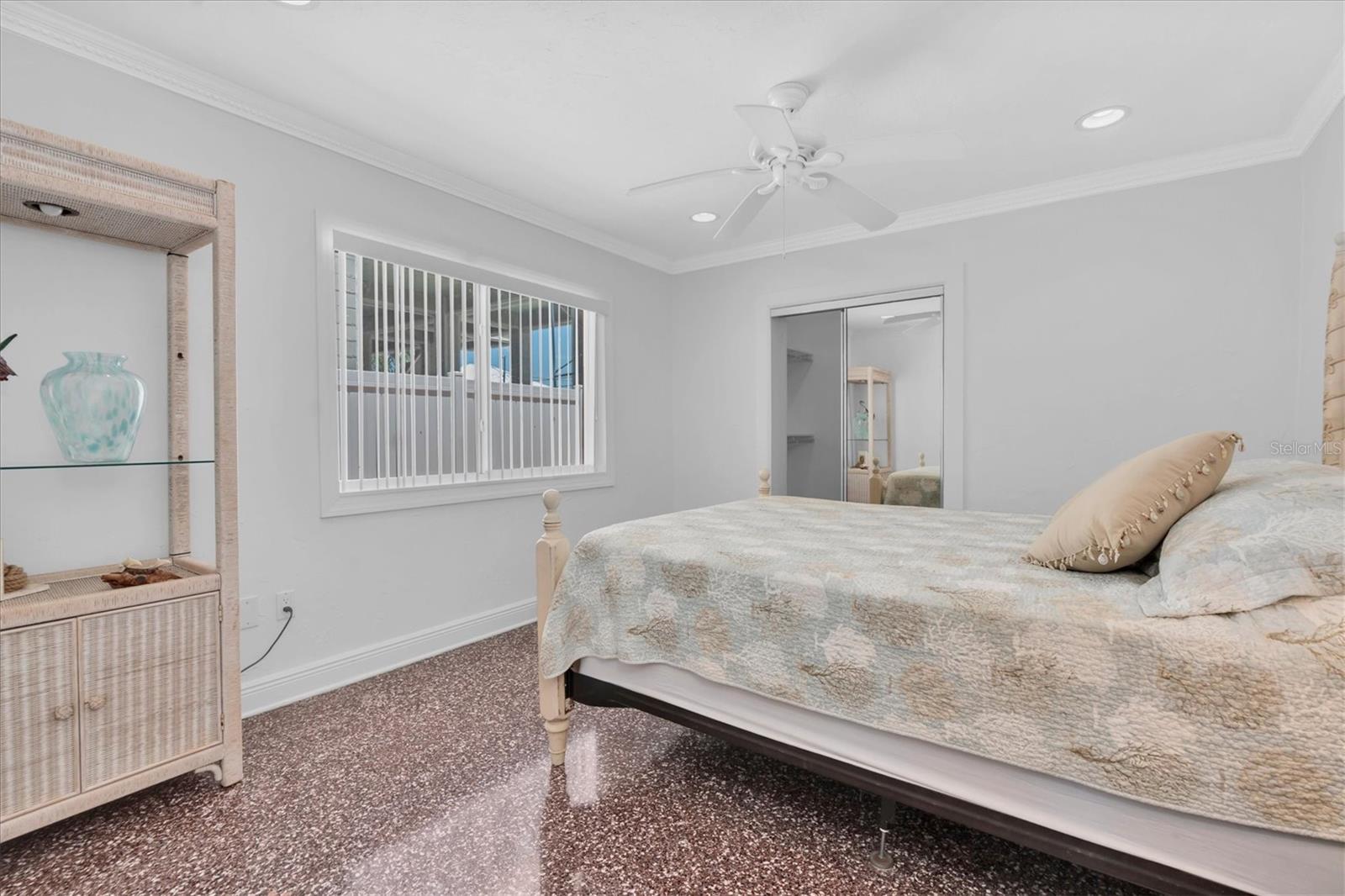 Bedroom with walk-in closet