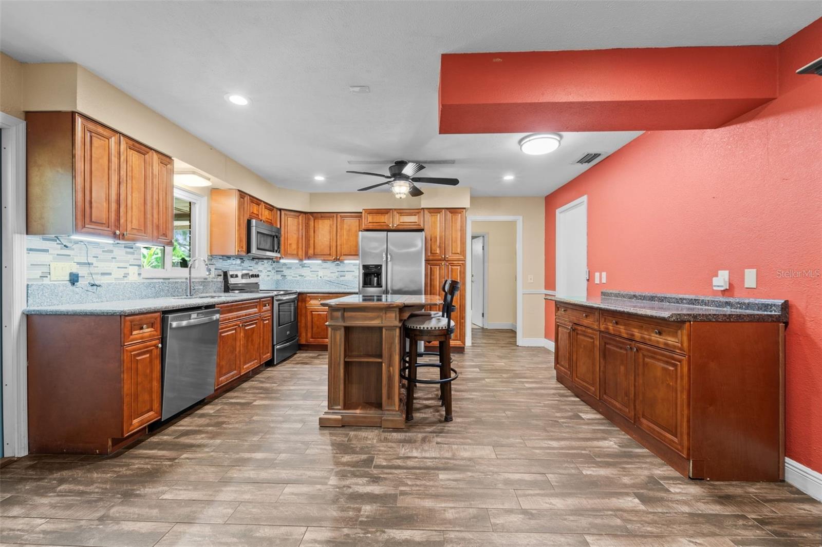 Kitchen with wood cabinets