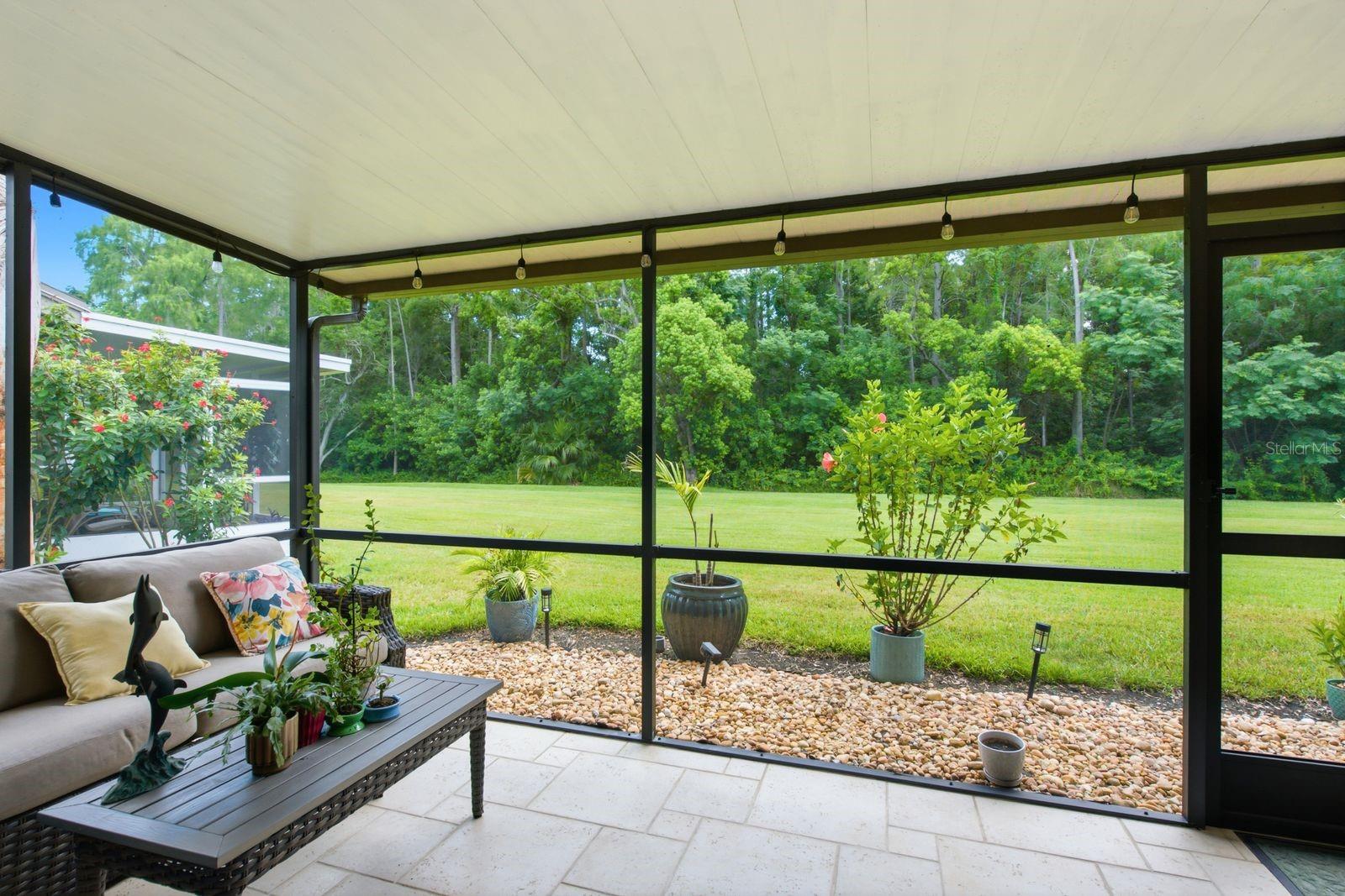 well sized screened in patio with privacy