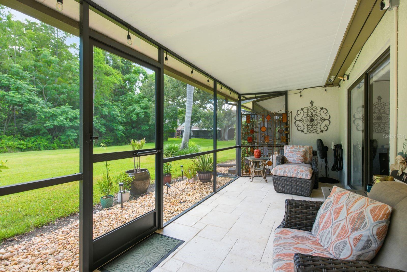 well sized screened in patio with privacy