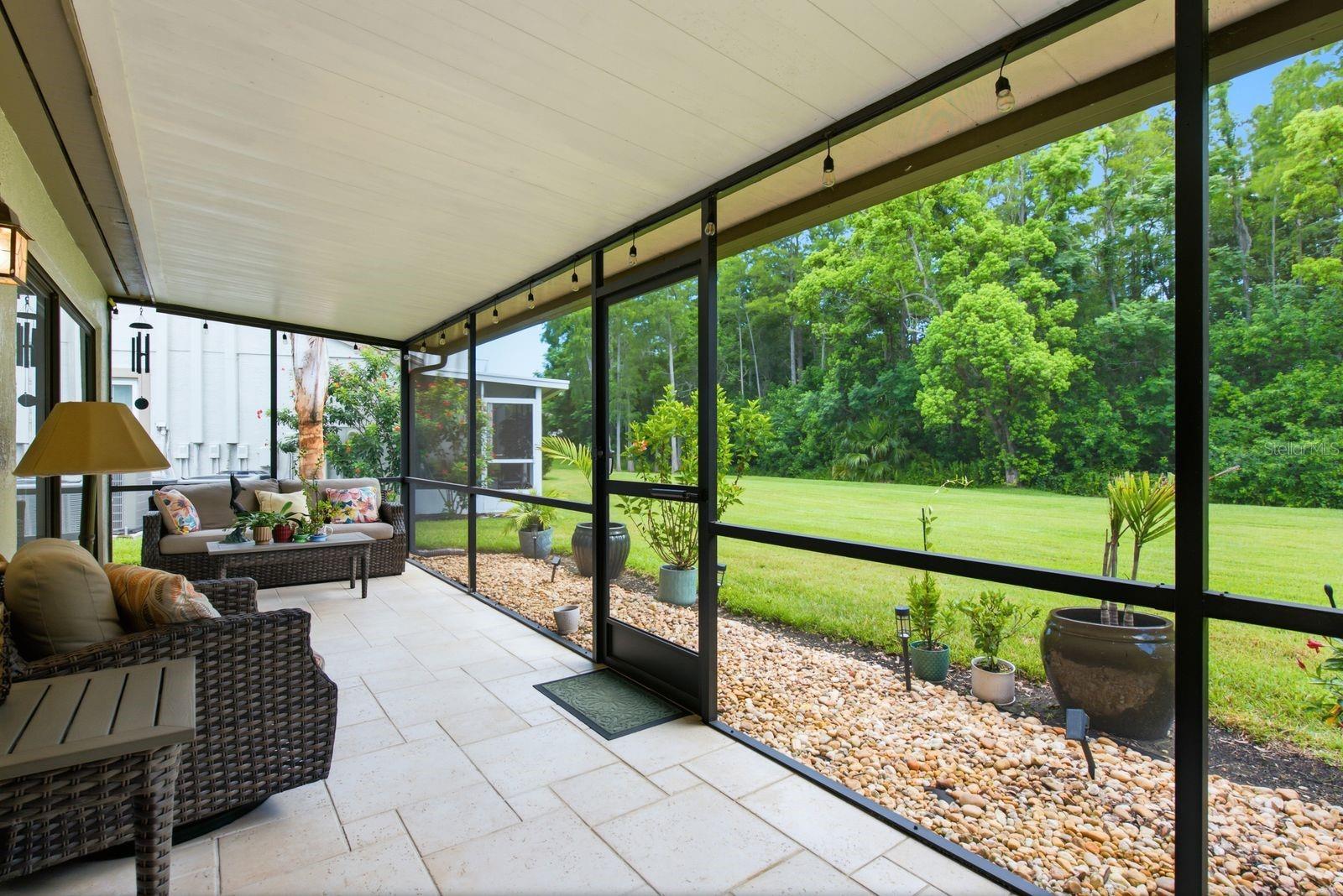 well sized screened in patio with privacy