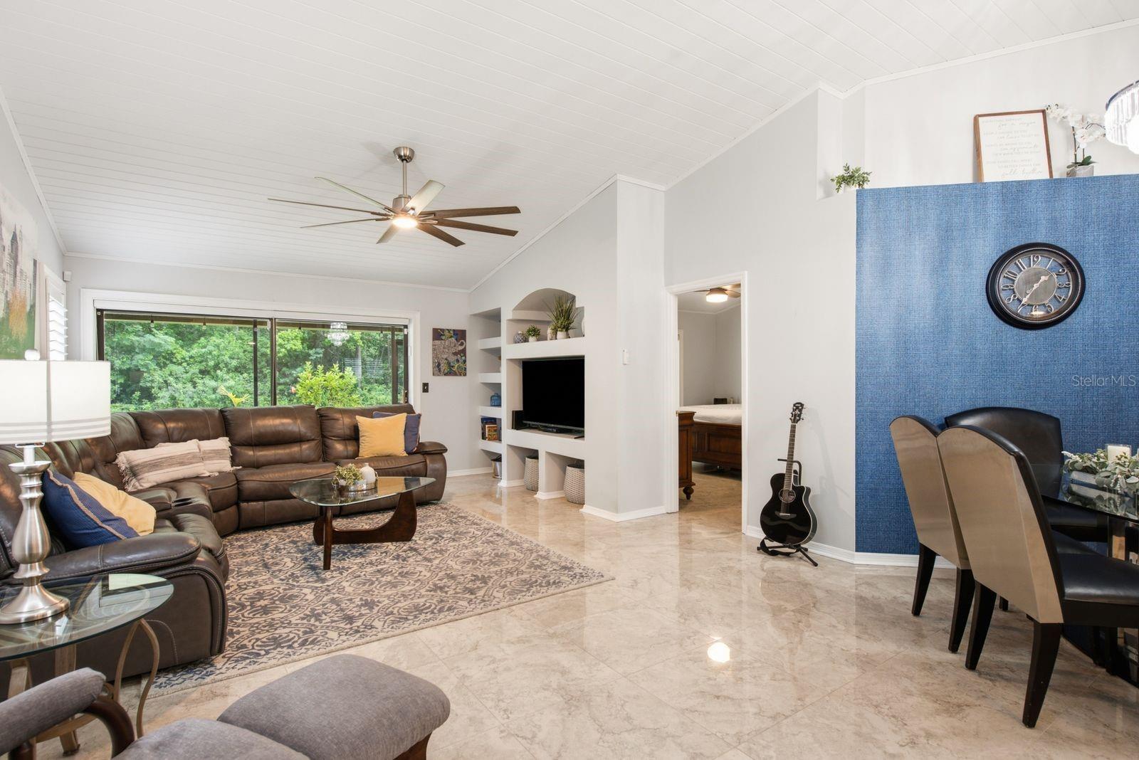 Family room - Stunning tile floors, sliding glass doors to a private patio