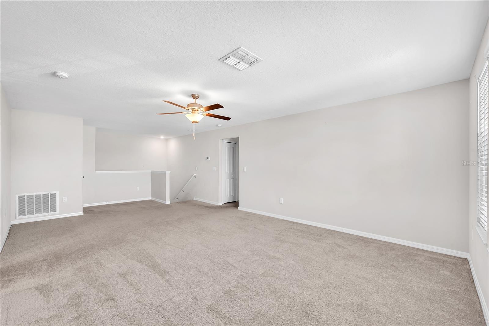 The 2nd floor Bonus Room divides 2 secondary bedrooms plus a full bath on one side and 2 additional secondary bedrooms and a full jack & jill bath on the other side.