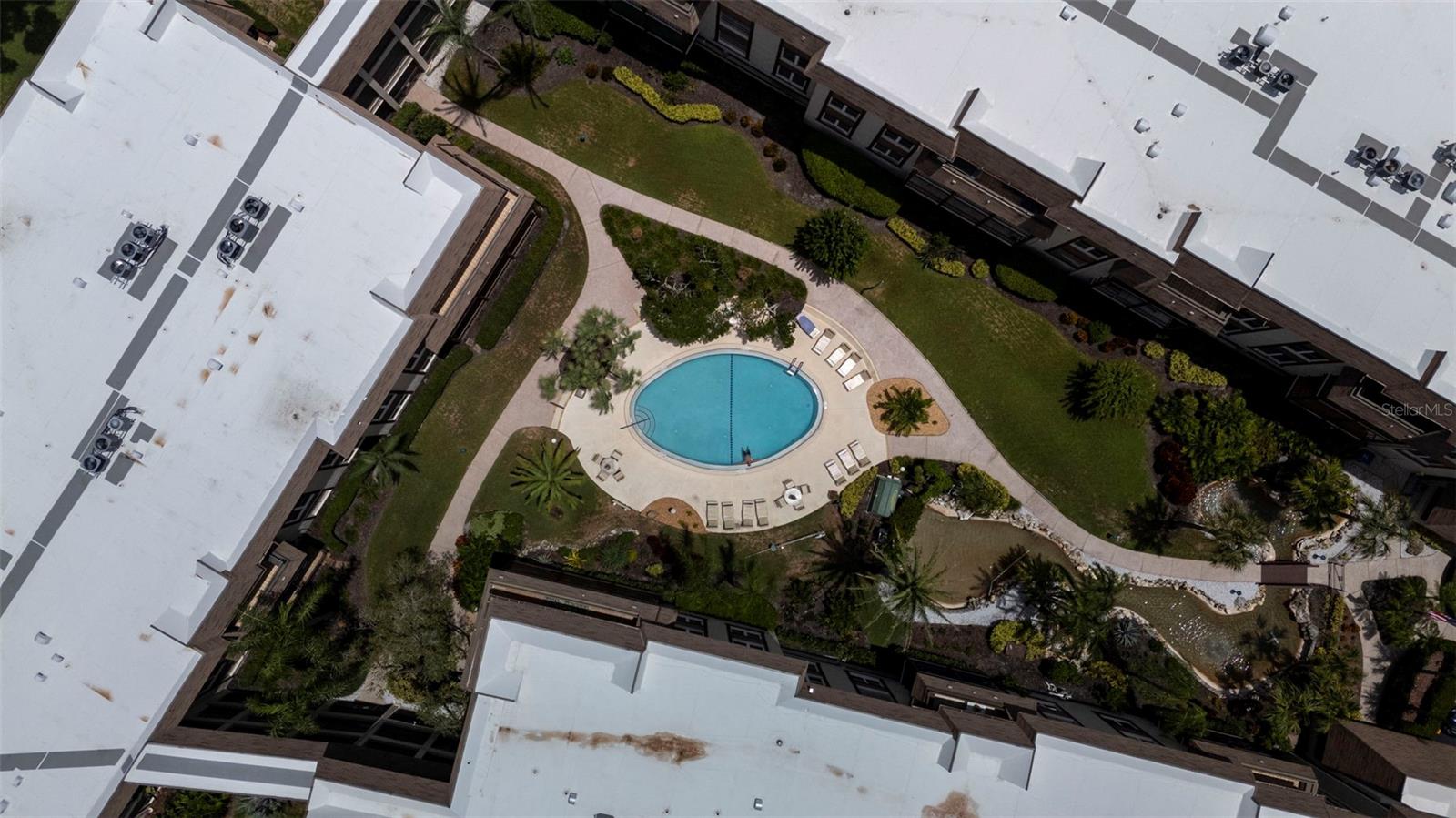 Courtyard with pool and several water features