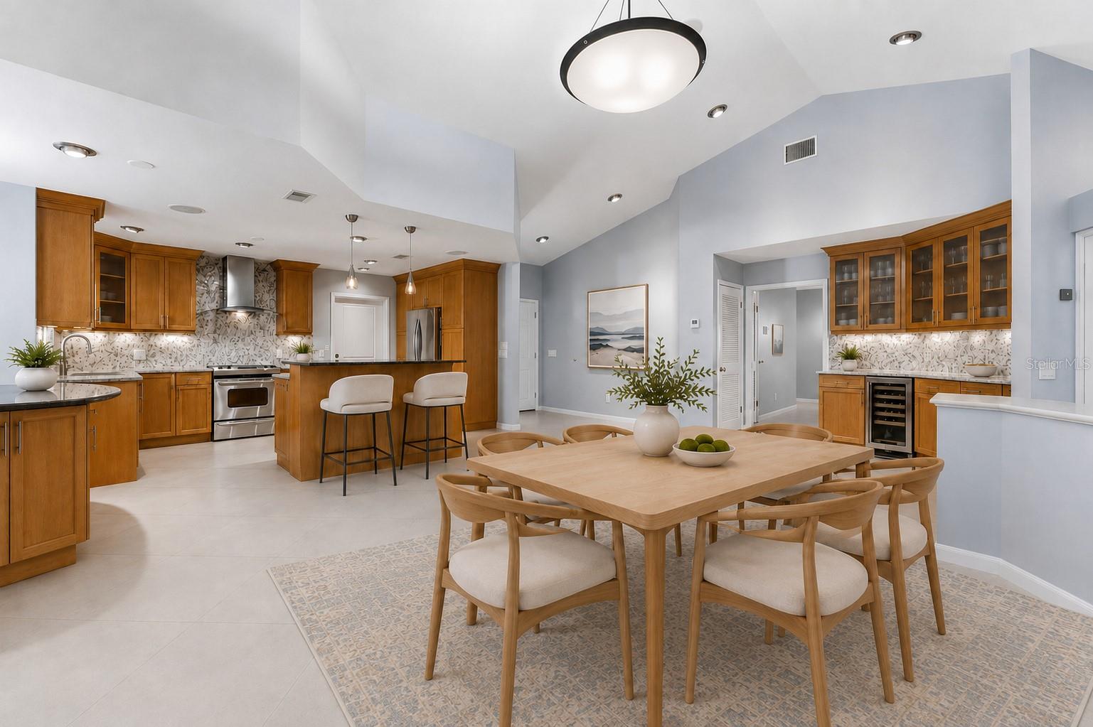Kitchen with wet bar on right of picture