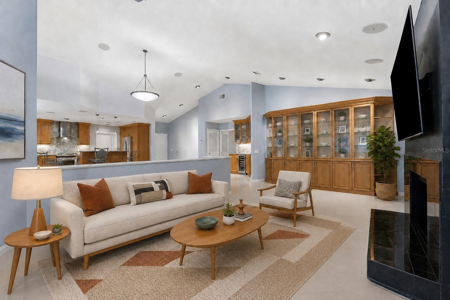 another view of family room with built in cabinets