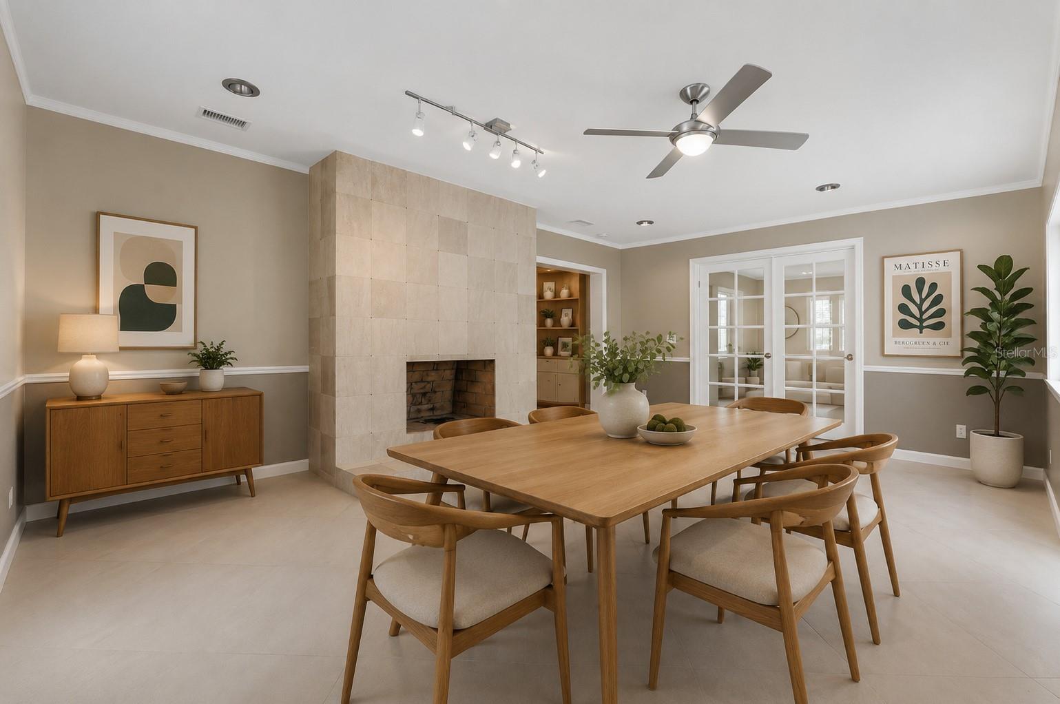 formal living room or dining room with french doors to bonus space